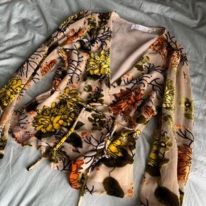 S Wrap Around Blouse from ASTR with autumn inspired floral detailing